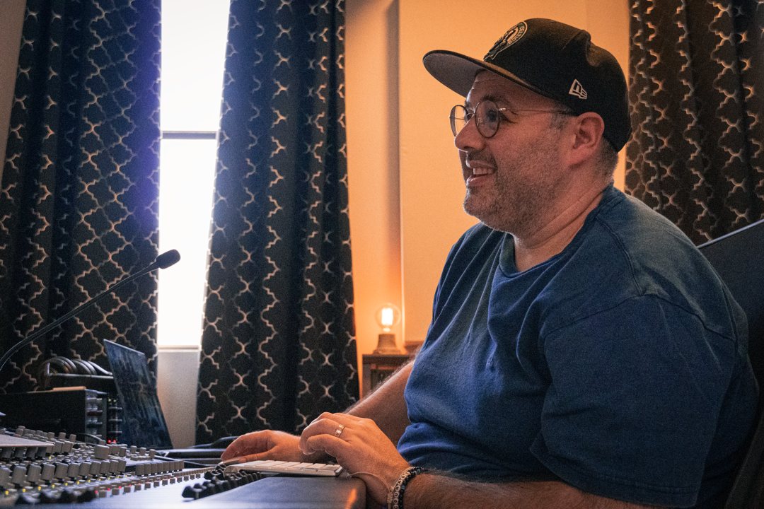 Co-owner and producer Jon Gautier at the console at Sound House Studios